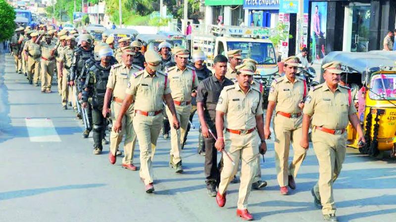 Police takes out a flag march in Kadapa on Wednesday as part of MLC polls.