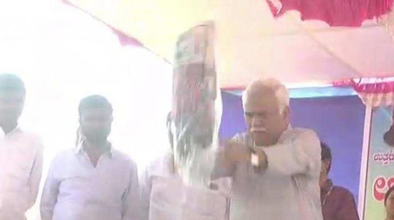 After the inauguration, speeches by the guests, the minister began distributing the kits. As the list of the beneficiaries was long, and they took time to reach the stage, Deshpande decided to fling the kits. (Photo: ANI video | Screengrab)