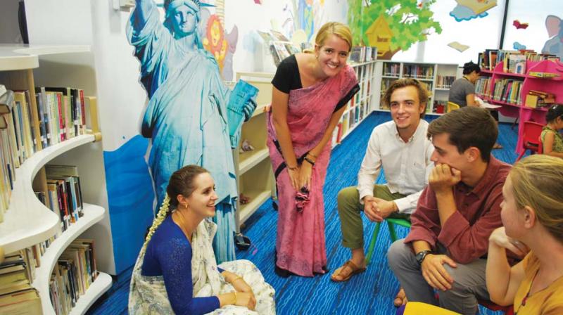 US graduates teaching in local schools (from Left to Right) Cathryn Roberts, Grace Oxley, Conor Coleman, Stephen Gay and Sarah Lamade. (Photo: DC)
