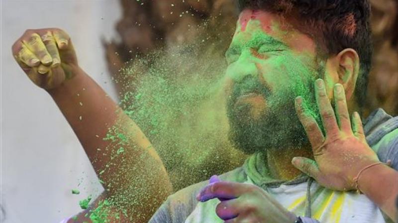 Holi is an ancient Hindu festival that celebrates the arrival of spring and the victory of good over evil. (Photo: AP)