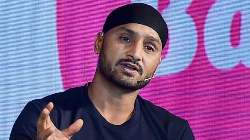 Senior off-spinner Harbhajan Singh feels Ravindra Jadeja is still in with a chance to make Indias World Cup squad on the back of his all-round skills but to survive purely as a finger spinner, he will have to improvise. (Photo: PTI)