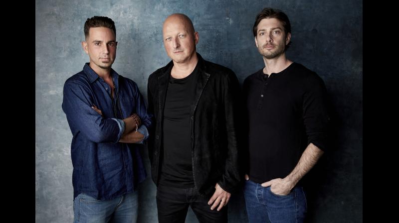 (From left) Wade Robson, director Dan Reed and James Safechuck pose for a portrait to promote the film \Leaving Neverland\ at the Salesforce Music Lodge during the Sundance Film Festival in Park City, Utah. (Photo: AP)