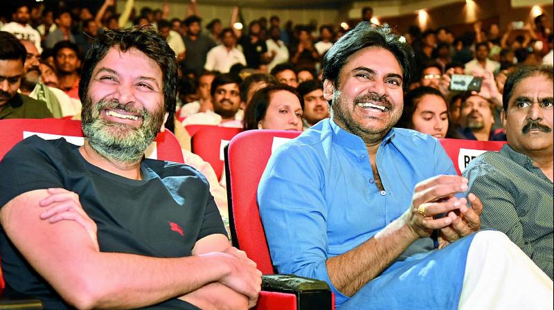 Trivikram and Pawan Kalyan are all smiles at the launch