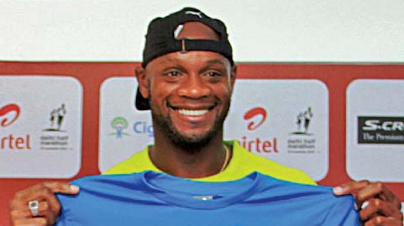 Jamaican sprinter Asafa Powell at an ADHM event in New Delhi on Friday.