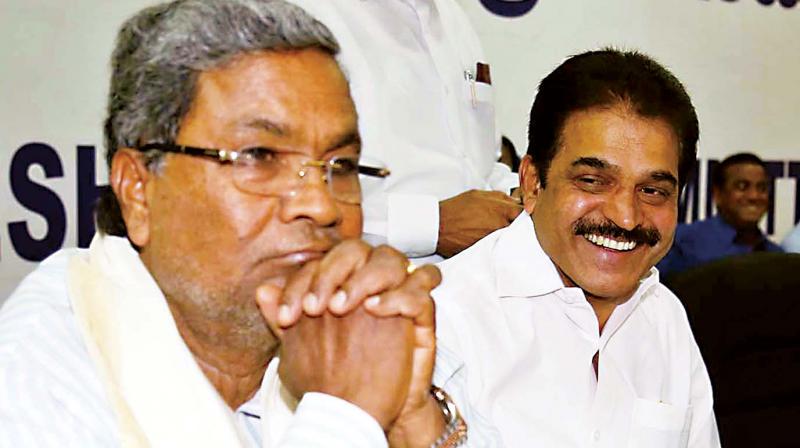 Chief Minister Siddaramaiah and AICC general secretary K.C. Venugopal address reporters at the KPCC office in Bengaluru on Friday.(Photo: DC)