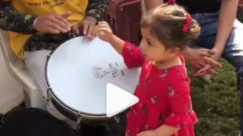 Screen capture from Misha playing the drum.