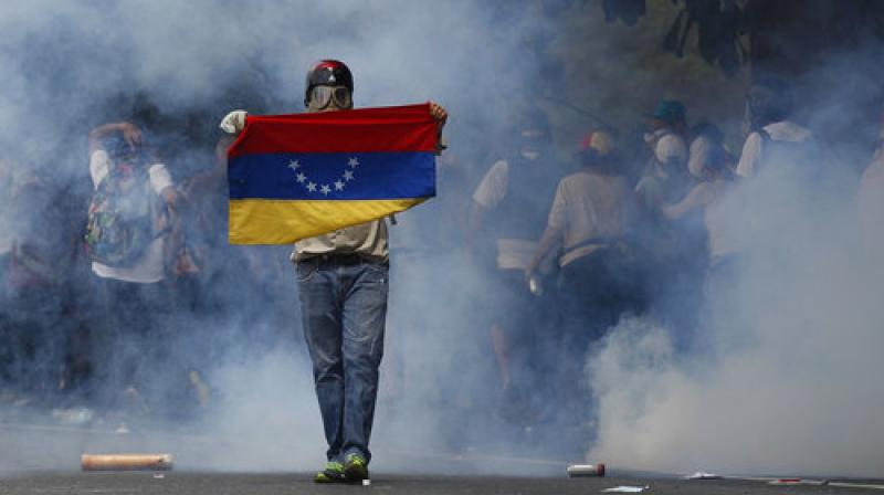 Two days of huge protests on the streets of Caracas against the socialist government of President Nicolas Maduro spilled into a violent Thursday night.