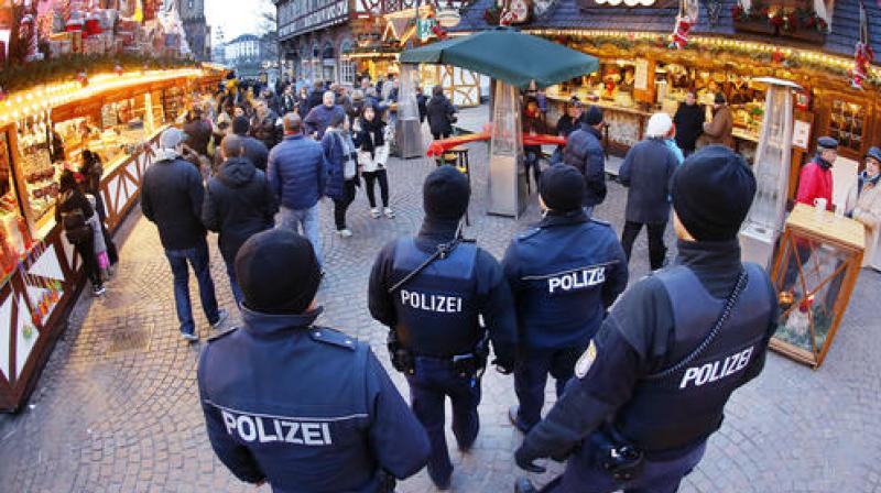 German police officers patrol over the Christmas market in Frankfurt, Germany. (Photo: AP)