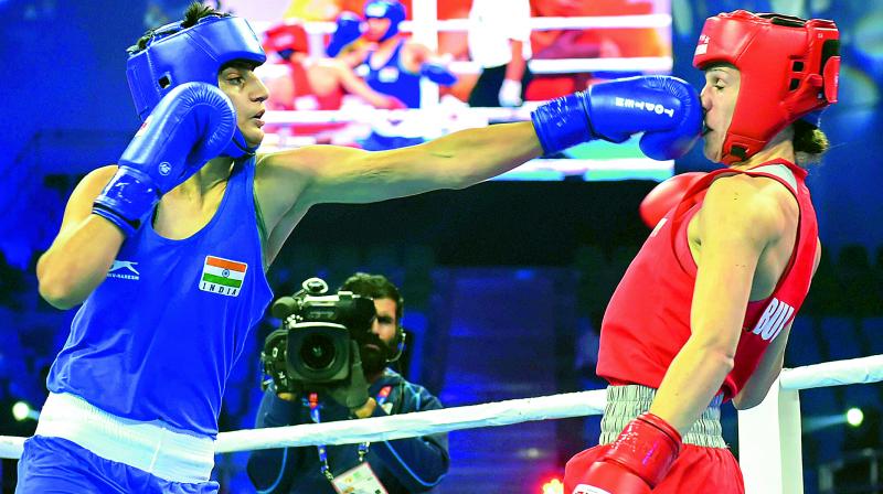 Indias Sonia Chahal (blue) punches Stanimira Petrova of Bulgaria during their light flyweight 57 kg category bout at AIBA Womens World Boxing Championships in New Delhi on Monday.(Photo:  PTI)