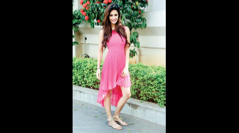 Bollywood actress Disha Patani shows to slay it in asymmetrical dresses, which are a hit this season