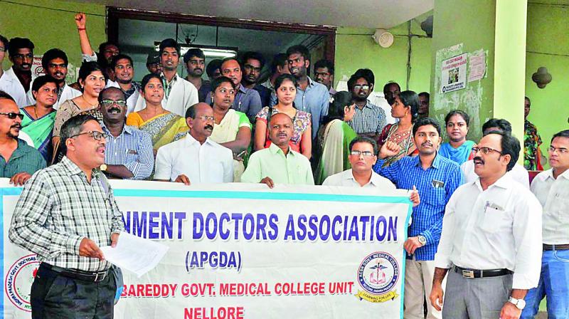 Members of Government Doctors Association protest at the Headquarter Hospital in Nellore city on Saturday. (Photo: DC)
