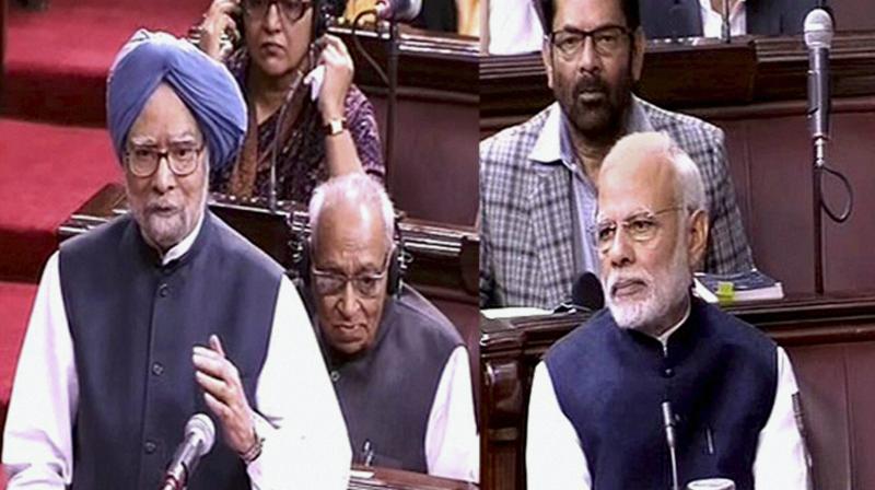 Prime Minister Narendra Modi listens to former PM Manmohan Singh (L) speaking in the Rajya Sabha in New Delhi. (Photo: PTI)