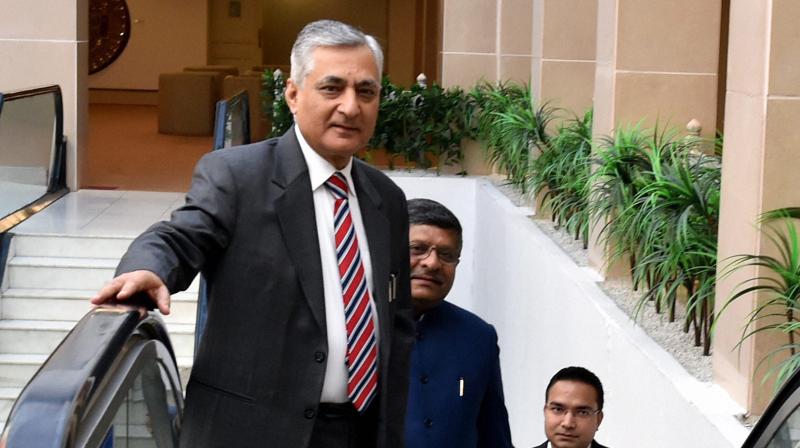 Chief Justice of India T S Thakur with Union Law Minister Ravi Shankar Prasad arrives for the All India Conference of the central Administrative Tribunal (CAT) in New Delhi. (Photo: PTI)