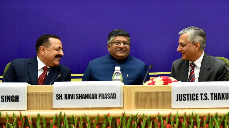 Chief Justice of India T S Thakur with Union Law Minister Ravi Shankar Prasad and Minister of State in Prime Ministers Office (PMO) Jitendra Singh at the All India Conference of the Central Administrative Tribunal (CAT) in New Delhi. (Photo: PTI)