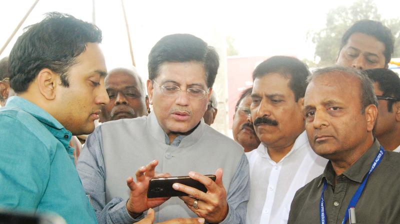 Railway Minister Piyush Goyal launches ticketing app at Belagavi  railway station on Saturday. (Photo: DC)