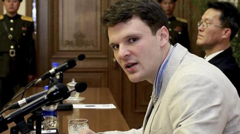 Warmbier, a student at the University of Virginia, was arrested for removing a political banner from a wall in a North Korean hotel during a visit.  (Photo: AP)