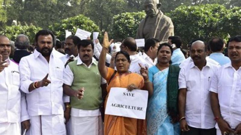 MPs of Opposition parties during a protest outside Parliament against the governments move to demonetise high tender notes, in New Delhi on Wednesday. (Photo: PTI)