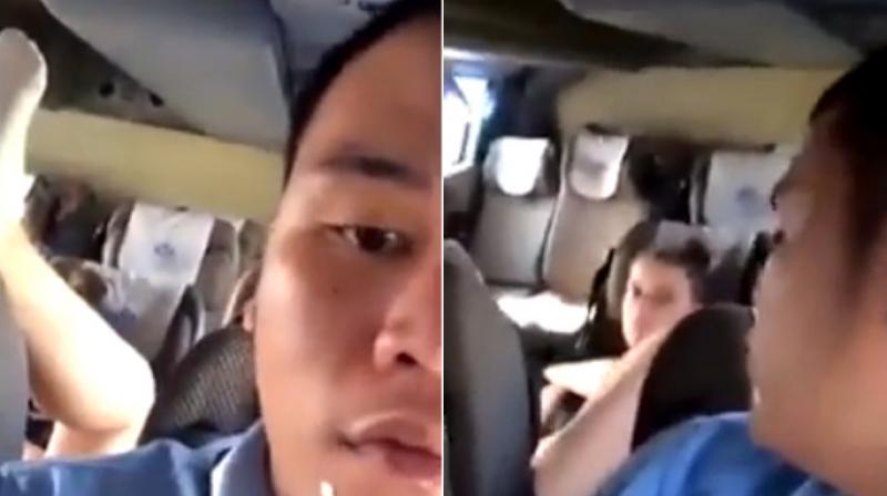 The bus going from Bangkok to Sukhothai province had a female traveller sitting in the back seat while her feet were raised above the seat. (Photo: Facebook)