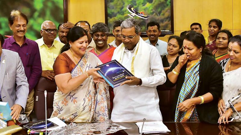 Jayamala, MLC, submits a report on sex workers to CM Siddaramaiah in Bengaluru on Monday. (Photo: KPN)