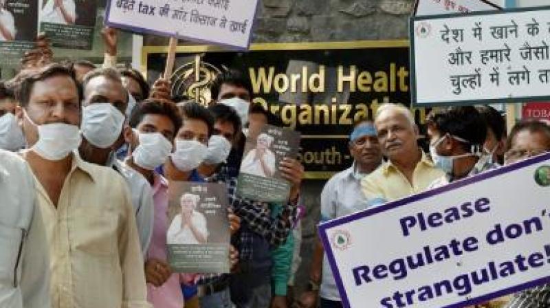 Indian tobacco farmers staged a demonstration at the venue of a global conference organised by the WHO in Greater Noida. (Photo: PTI/Representational)
