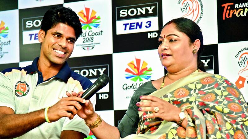 Asian Games double medallist tennis player J. Vishnu Vardhan and weightlifter Karnam Malleswari, Indias first woman Olympic medal winner, share a light moment while speaking to reporters in Hyderabad on Wednesday. (Photo: DC)