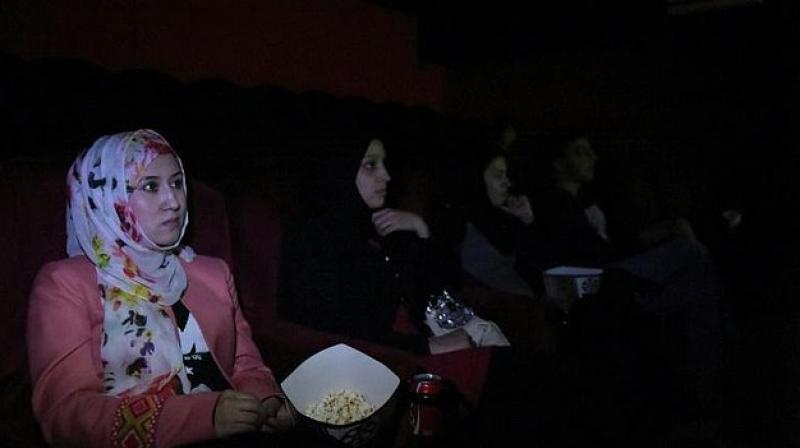 As Zahra Sozan, a 25-year-old mother-of-one told AFP, it is not \traditional\ for women or children to go to the movies. (Photo: AFP)