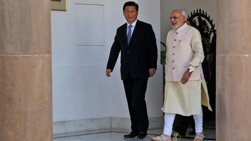 Prime Minister Narendra Modi with his Chinese counterpart Xi Jinping. (Photo: AP)