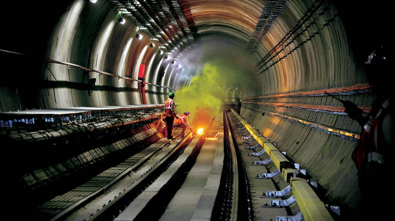 BMRCL officials conduct the fire and smoke test of North-South underground section during an inspection by Bengaluru Development Minister K.J. George, in Bengaluru on Wednesday. (Photo: Satish B)