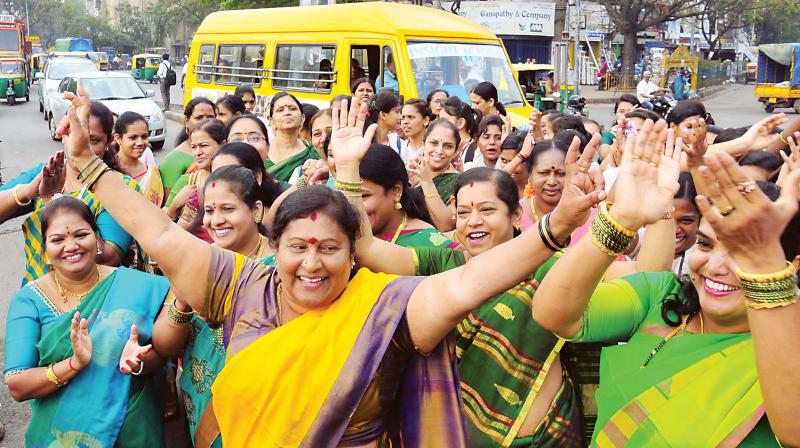 Mayor G. Padmavathi and other women corporators celebrate Womens Day in Bengaluru on Wednesday. (Photo: DC)