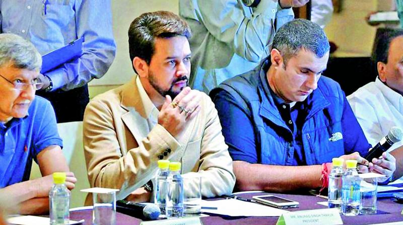 Ajay Shirke (left) and Anurag Thakur (right) were removed as BCCI secretary and president respectively by the Supreme Court (Photo: AP)