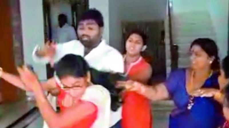 Video grab of TRS leader Srinivas Reddy abusing his wife at his residence.