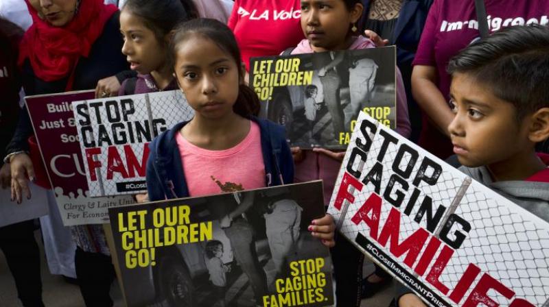 More than 2,000 children have been separated from their parents in recent weeks and placed in government-contracted shelters  hundreds of miles away, in some cases  under a now-abandoned policy toward families caught illegally entering the US. (Photo: AP)