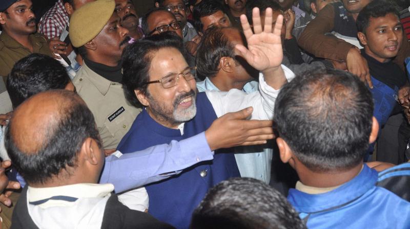 TMC MP Sudip Bandopadhyay being taken by CBI officers to Bhubaneswar for further inquiry who was arrested in connection with Rose Valley chit fund scam. in Kolkata. (Photo: PTI)