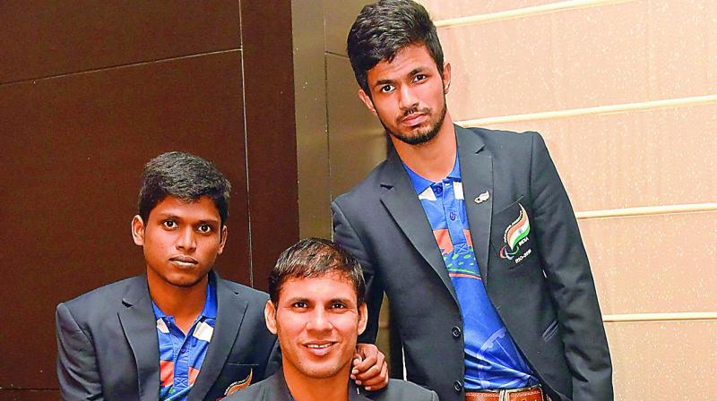 Team India: Mariyappan Thangavelu, Devendra Jhajharia and Varun Singh Bhati