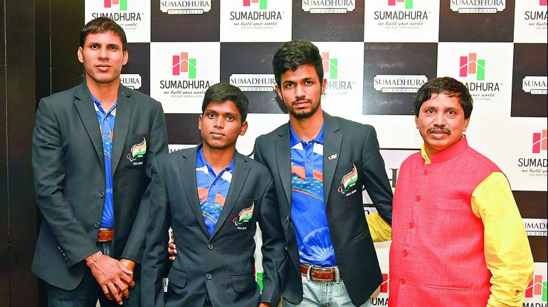 Team India: Mariyappan Thangavelu, Devendra Jhajharia and Varun Singh Bhati and Satyanarayana