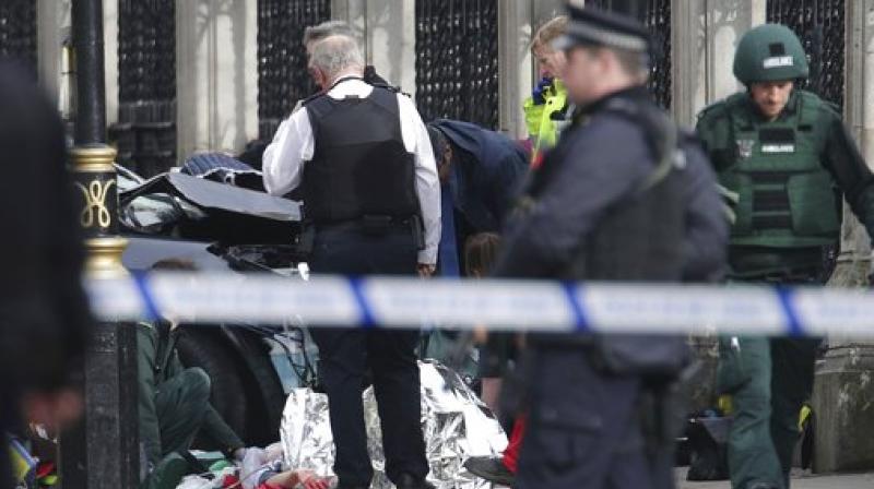 The UK House of Commons session has been suspended as witnesses reported sounds like gunfire outside. The latest report said that a policeman was stabbed inside the Parliament.