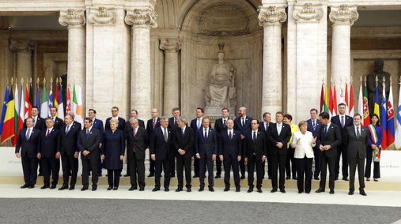 European Union heads of state pose for a group photo in the Cortile di Michelangelo during an EU summit in Rome on Saturday. (Photo: AP)