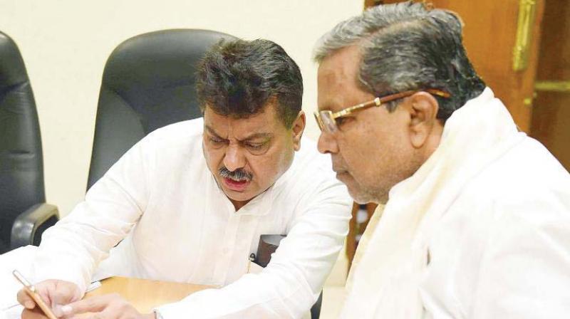 A file photo of Water Resources Minister M.B. Patil with Chief MInister Siddaramaiah