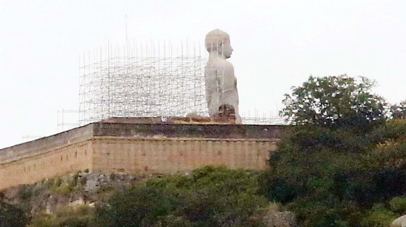 Scaffolding erected behind the statue of Bhahubali at Shravanabelagola for Mahamastakabhisheka. (Photo: DC)