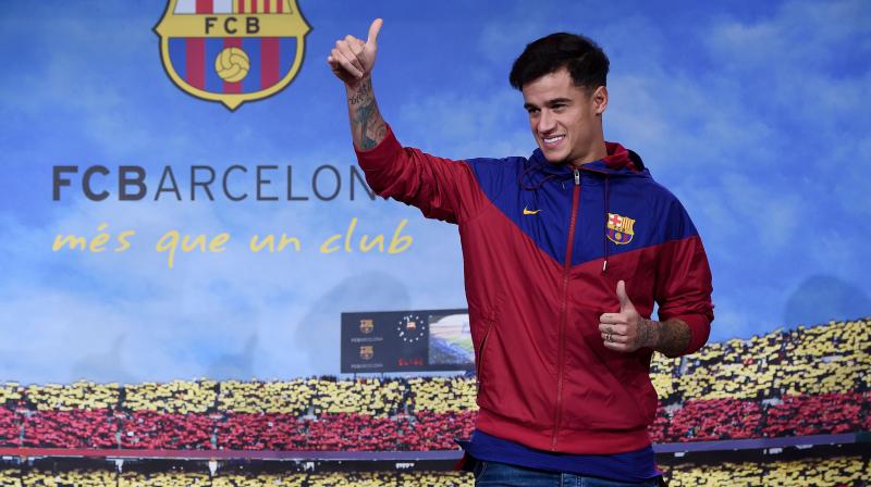 : Philippe Coutinho officially signed with Barcelona on Monday but the club said his debut will be delayed by about three weeks because of a muscle injury.(Photo: AFP)