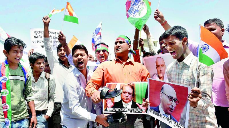 People protest against the death sentence verdict to Kulbhushan Jadhav by the Pakistani military court, in Patna on Tuesday. (Photo: PTI)