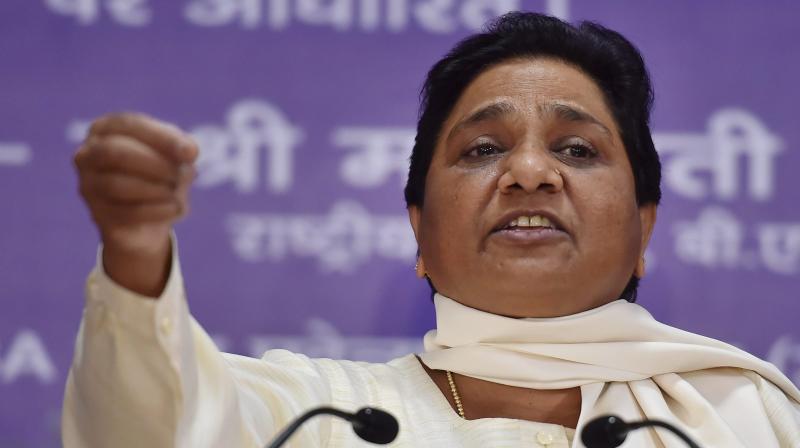 BSP supremo Mayawati addressing press conference at her residence in Lucknow. (Photo: PTI)