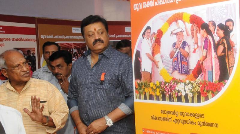 Suresh Gopi, MP, and O. Rajagopal, MLA, during the photo exhibition as part of the third anniversary of the Narendra Modi government organised by Ministry of Information and Broadcasting in Thiruvananthapuram on Wednesday. (Photo: A.V. MUZAFAR)