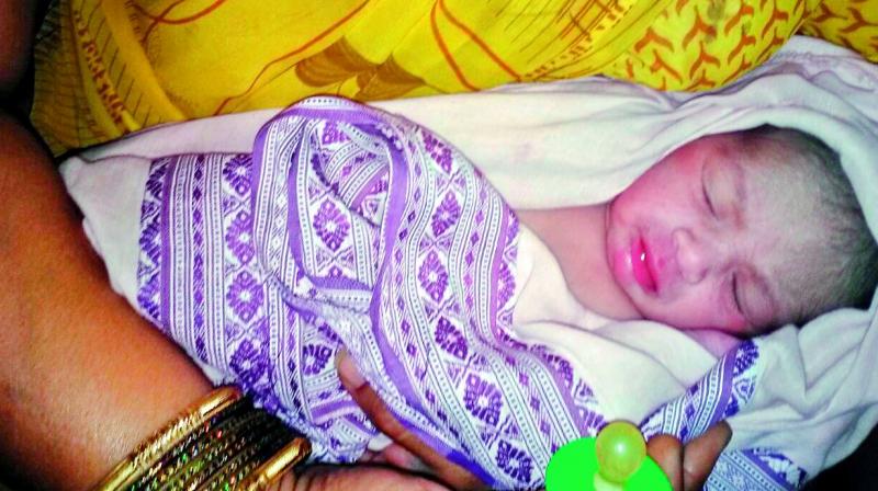 The newborn girl child who was found inside a parked auto at Pasra village in Govindaraopet mandal of Jayashankar Bhupalapalli district.