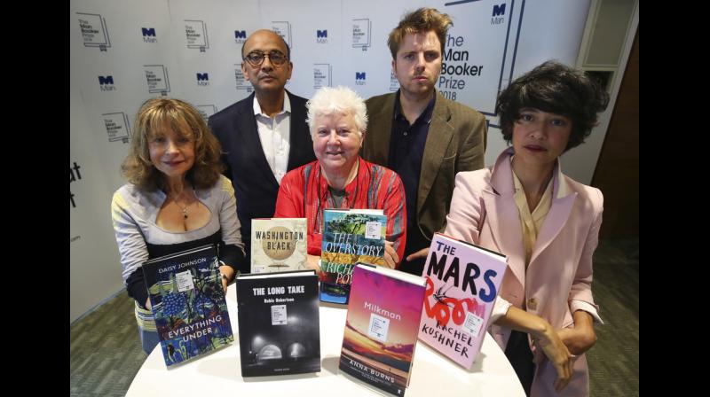 The panel of judges, from left, Jacqueline Rose, Kwame Anthony Appiah, Val McDermid, Leo Robson and Leanne Shapton pose for a photo, during the Man Booker Prize 2018 shortlist announcement. (Photo: AP)