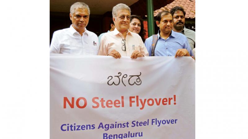 Activists against steel flyover Prakash Belawadi, Naresh Narasimhan, Sridhar Pabbisetty, Priya Chetty Rajagopal and others during a press meet by Citizens Against Steel Flyover, in Bengaluru Friday (Photo: DC)
