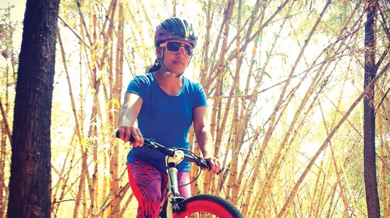 A photograph of city cyclist Archana Sheshagiri