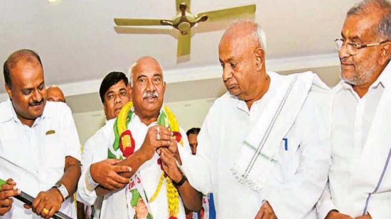 A file photo of former MP A.H. Vishwanath with JD(S) supremo H.D. Deve Gowda