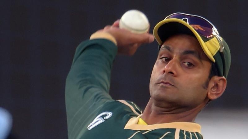 Mohammad Hafeez has faced problems with his bowling action since 2014 and in July 2015 was banned from bowling in international cricket for 12 months after his action was found to be illegal for a second time since November 2014. (Photo: AFP)