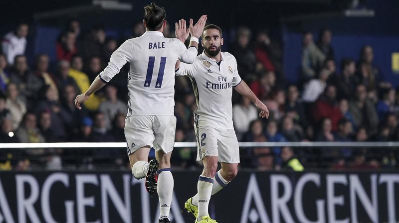 Real Madrid lead Barcelona by a point in La Liga. (Photo: AP)